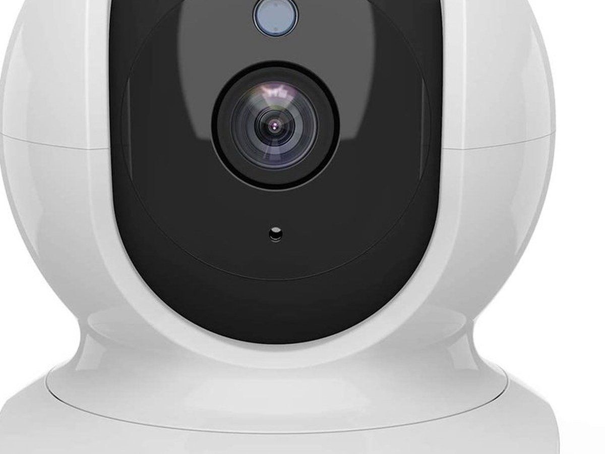 White indoor pan-tilt Wi-Fi camera on a table